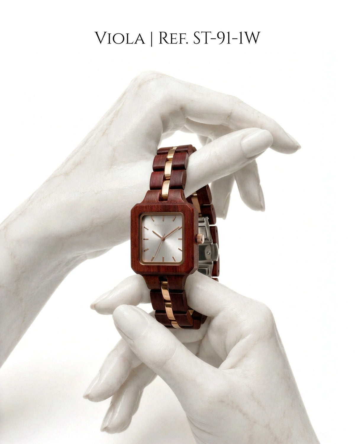 Watch on wooden strap coiled like a snake
